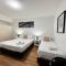 city staycation studio with 2 beds