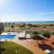 Onze - primera línea de mar con piscina