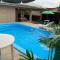 Casa com piscina no litoral do Paraná em Matinhos - Matinhos