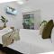 Cozy 3-Bedroom Oasis with Pool Access in Cairns
