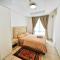 Stategic 1et Cikditiro 2BR Apt with Pool, Gym, Wi-Fi by 2ndHome - Jakarta