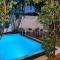 A tropical paradise; stunning house, pool, garden