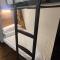 Beijing Xingshe Youth Hostel--Nearby Tiananmen square & Forbidden City & Houhai Bar street--1 minute walk to subway, Cat-keeping, Great wall&Forbidden city one day tour, Wifi and laundry room, English speaking Reception