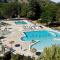 Camping La Grand'Terre 4 étoiles - Linge de maison inclus - Clim - TV - Plancha - Lave-vaisselle - 4 personnes 2 chambres