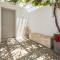 MICHAEL ZEPPOS STUDIOS NAOUSA
