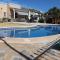 Chalet Athos, Ferienwohnung mit Pool,Dachterasse, Meer und Bergblick in San Juan de los Terreros - Pulpí