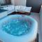 Jacuzzi area with sunset, terrace, free parking