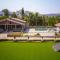 StayVista at Aura Farmstay with Pool & Lawn - Badlapur