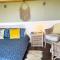 1Br-Sleeps2-Field View-Parking-Cabin Experience