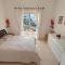 Eva Gardens corner house with stunning garden and huge swimming pool next to CORAL BAY