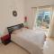 Eva Gardens corner house with stunning garden and huge swimming pool next to CORAL BAY