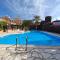 Eva Gardens corner house with stunning garden and huge swimming pool next to CORAL BAY