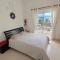 Eva Gardens corner house with stunning garden and huge swimming pool next to CORAL BAY