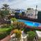 Eva Gardens corner house with stunning garden and huge swimming pool next to CORAL BAY