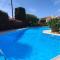 Eva Gardens corner house with stunning garden and huge swimming pool next to CORAL BAY