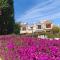 Eva Gardens corner house with stunning garden and huge swimming pool next to CORAL BAY