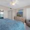 Marvel at the spectacular views from this bright corner condo! - New Smyrna Beach