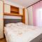 Apartments with parking spaces Lopar, Rab - 22558