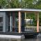 Modern houseboat with view of the Lake - Offingawier