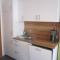 Kachelofenwohnung Pölzleitner