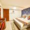FabHotel Pleasure Inn - Near DB Mall