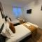 24-7 Secured City Centre Apartments with Free Underground Parking and WiFi