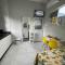 Mini apt 5 m centro com ar, cozinha e garagem - 迪维诺波利斯