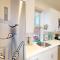 Chic Penthouse 15 Minutes From NYC - bus stop at doorstep