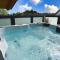 "Penthouse Suite" mit Whirlpool Romantik und Privatsphäre "Penthouse Suite" mit Whirlpool Romantik und Privatsphäre