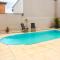 Ap 2 Árvore com piscina com aquecimento solar e churrasqueira