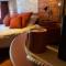 "Le Maloya" Chalets independants -Chambre Balneo - Relais Motards