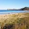 Oceanfront 4-Bed Haven with BBQ & Alfresco Dining