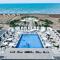 Sea Breeze Resort, Beachfront apartment with a balcony and sea view