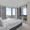 Spire - Stylish 2BR Apt - Pool, Parking & Views