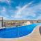 Spire - Stylish 2BR Apt - Pool, Parking & Views