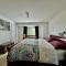 Spacious 7 BR Home with Two Kitchens