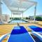 1BR w Garden and Rooftop Pool - Szeeb