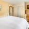 Riverside Condo, with a Pool & Hot Tub - Steps to Town - Aspen