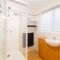 Renovated two-level Sandy Bay apartment