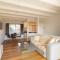 Renovated two-level Sandy Bay apartment