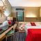 WISDOM Boutique Hotel Near the National Birds Nest National ConventionCentre and Olympic Forest Park Just a 5-minute walk from Line 15s Anli Lu Subway Easy access tothe airport