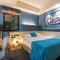 WISDOM Boutique Hotel Near the National Birds Nest National ConventionCentre and Olympic Forest Park Just a 5-minute walk from Line 15s Anli Lu Subway Easy access tothe airport