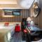 WISDOM Boutique Hotel Near the National Birds Nest National ConventionCentre and Olympic Forest Park Just a 5-minute walk from Line 15s Anli Lu Subway Easy access tothe airport