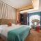 WISDOM Boutique Hotel Near the National Birds Nest National ConventionCentre and Olympic Forest Park Just a 5-minute walk from Line 15s Anli Lu Subway Easy access tothe airport