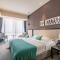 WISDOM Boutique Hotel Near the National Birds Nest National ConventionCentre and Olympic Forest Park Just a 5-minute walk from Line 15s Anli Lu Subway Easy access tothe airport