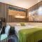 WISDOM Boutique Hotel Near the National Birds Nest National ConventionCentre and Olympic Forest Park Just a 5-minute walk from Line 15s Anli Lu Subway Easy access tothe airport