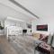 Bright 2BR Pad with Scenic City-View, Gym & Pool