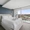 Bright 2BR Pad with Scenic City-View, Gym & Pool