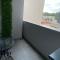Riverside apartment with private parking