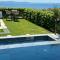 New luxury apartment with PRIVATE Heated POOL and amazing terrace with seaview